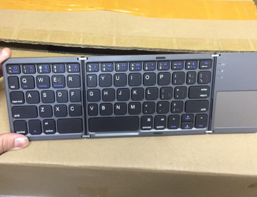Faltbares ultradünnes kabelloses Touch Keyboard für Mobiltelefone und Tablets